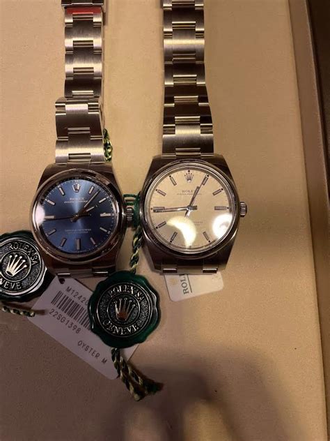 rolex op34 vs 114200